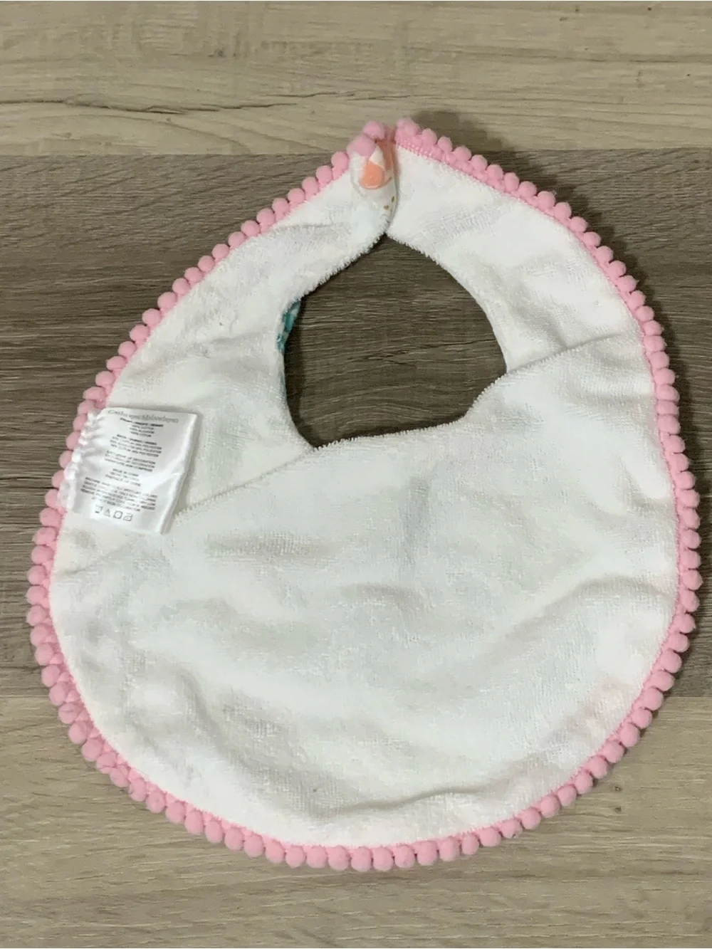 🟢 Catherine Malandrino Floral Pom-Trim Baby Bib in Pink and Peach